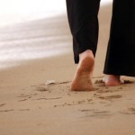 Woman walking on the sandbeach